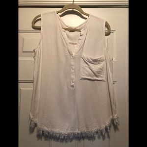 Cute sleeveless cream colored frayed shirt